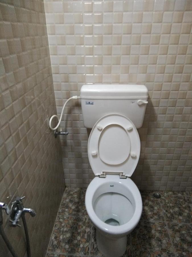 Maniis Homestay Vālpārai Bagian luar foto